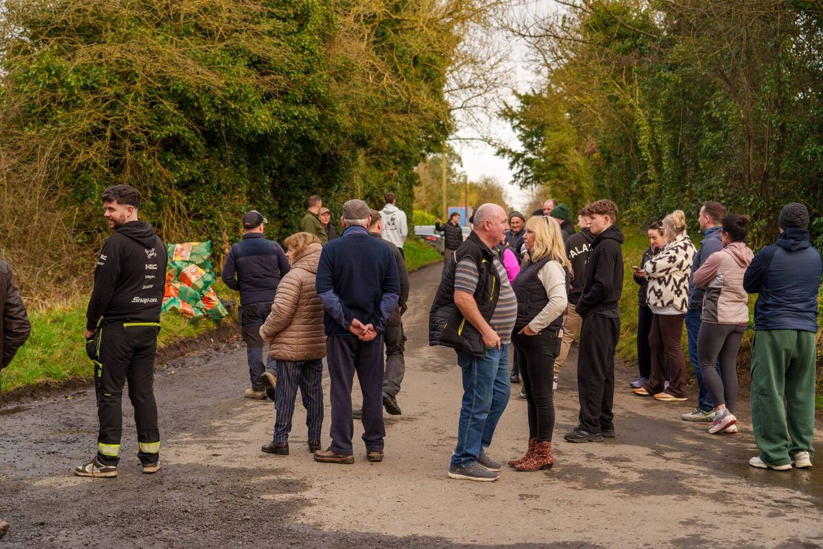 Friends, relatives and supporters of the family are also pictured. Picture: Barry Cronin/The Irish Times.