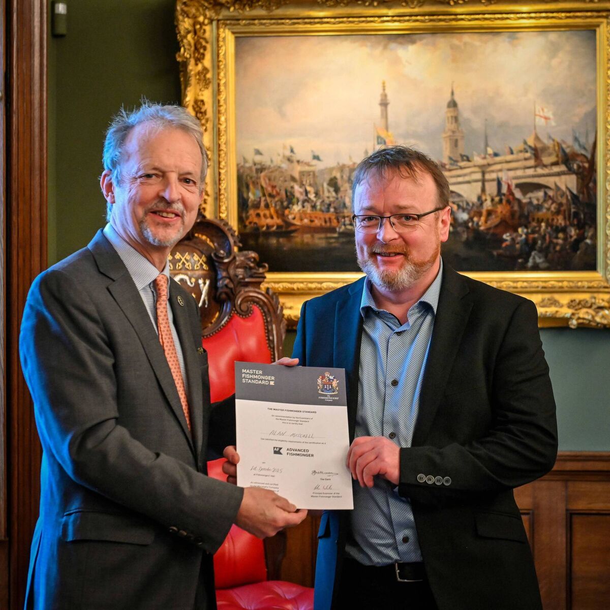 Fishmonger Alan Mitchell (right)receiving his BIM Master Fishmonger award