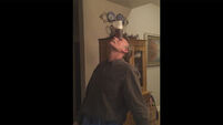 VIDEO: This 60-year-old can drink a pint resting on his forehead using no hands