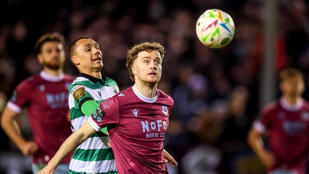<p>Shamrock Rovers' Graham Burke and Drogheda United's Andrew Quinn challenge for the ball. Pic: Dan Clohessy/Inpho</p>