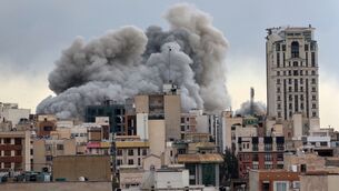 <p>FILE - A plume of smoke rises after a strike in Tehran, Iran, Monday, March 2, 2026. Picture: AP Photo/Mohsen Ganji</p>