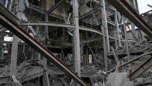 <p>The shattered structure of a police station  after it was hit in a US-Israeli strike in Tehran, Iran. Picture: Vahid Salemi/AP</p>