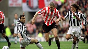 <p>NICE TOUCH: Sunderland hero Niall Quinn dances around Nikos Dabizas and Clarence Acuna of Newcastle in an FA Cup clash at the Stadium of Light. Pic: Stu Forster/Allsport</p>