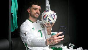 <p>HOLES IN THE PLAN: Troy Parrott celebrates with the match ball after scoring a hat-trick against Hungary. Pic: Stephen McCarthy/Sportsfile</p>