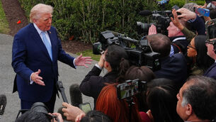 <p>President Donald Trump speaks with reporters before departing on Marine One from the South Lawn of the White House, Friday, March 20, 2026, in Washington. (AP Photo/Julia Demaree Nikhinson)</p>