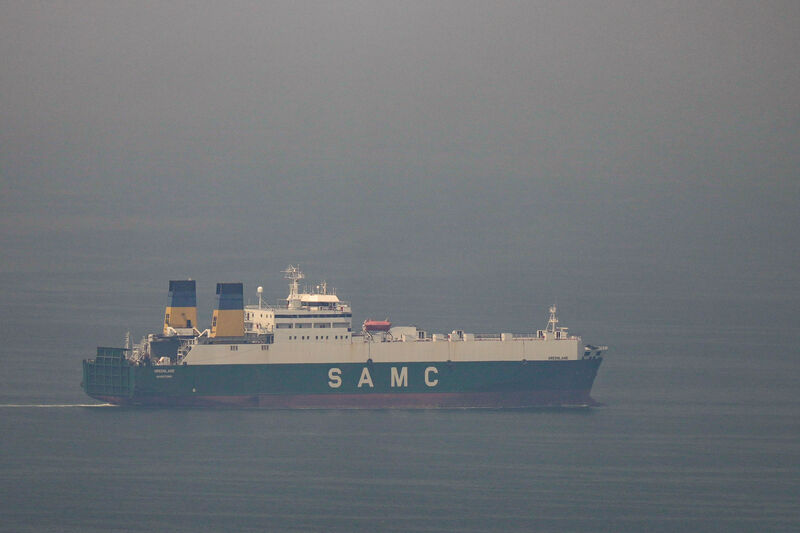 A cargo ship sails in the Arabian Gulf towards Strait of Hormuz in United Arab Emirates last weekend. Picture: AP Photo/Altaf Qadri