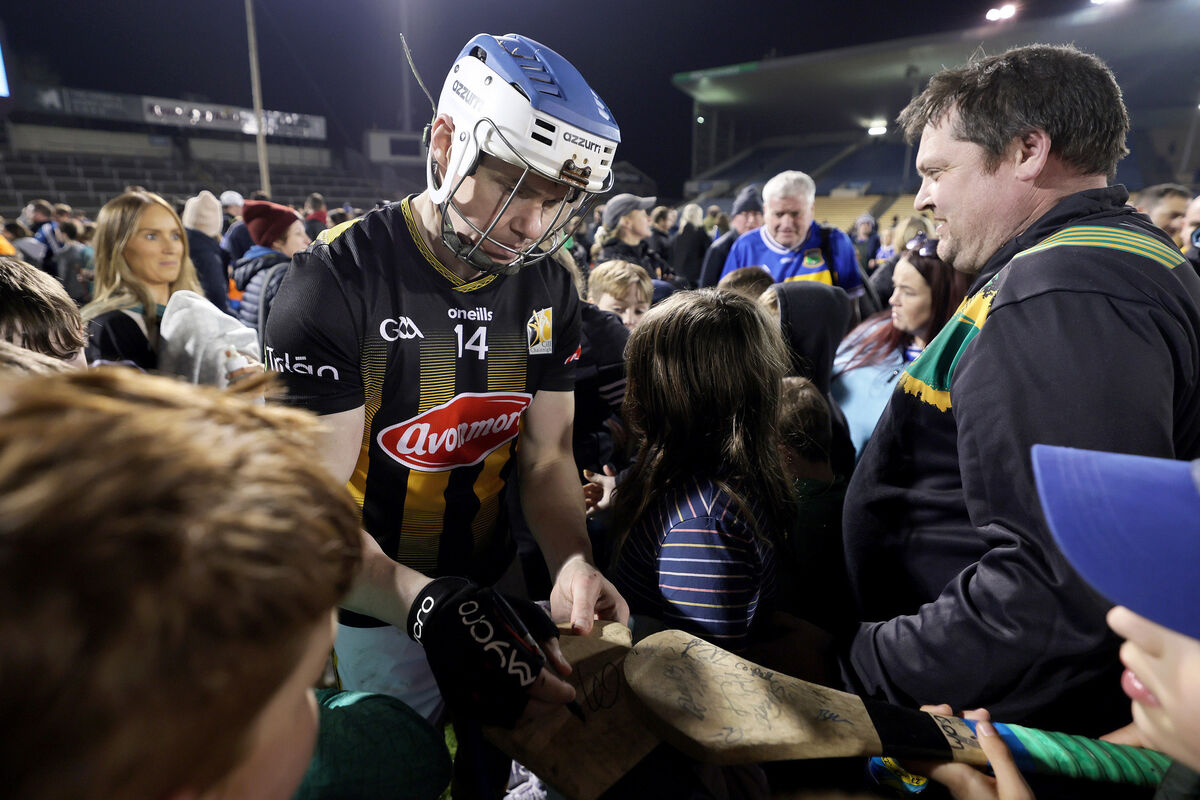 Kilkenny's TJ Reid signs autographs after the game. Pic: ©INPHO/Laszlo Geczo