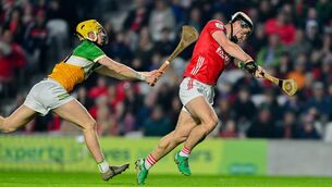 <p>STARLET: Cork U20 ace Barry Walsh nails the Rebels' first goal despite the efforts of Offaly's Daniel Bourke in Saturday's Allianz HL Division 1A tie at SuperValu Páirc Ui Chaoimh. Pic: Tyler Miller/Sportsfile</p>