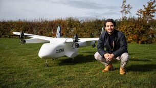 <p>Iona founder Etienne Louvet with one of the company's drones. </p>
