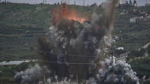 Israel struck the Qasmiyeh bridge near Tyre in Lebanon on Sunday, further isolating residents from the rest of the country (Mohammad Zaatari/AP)