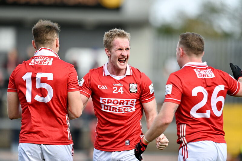 Ruairi Deane of Cork celebrates with Steven Sherlock and Brian Hurley of Cork. Photo by Oliver McVeigh/Sportsfile