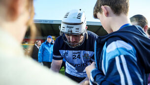<p>ON THE ROAD: Dublin's Conor Donohoe signs an autograph for a fan after the win over Carlow. Pic: Nick Elliott, Inpho</p>
