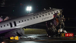 The Air Canada Jet collidd on the runway at LaGuardia Airport (AP) The Air Canada Jet collidd on the runway at LaGuardia Airport (AP)