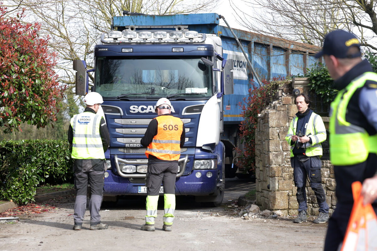  Trucks and workmen at the house in Co Meath on Friday which is at the centre of the 20-year legal battle. Photo: Leah Farrell/© RollingNews.ie