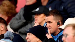 <p>SIDELINED: Dublin’s manager Ger Brennan watches on from the stands after being red-carded. Pic: INPHO/James Crombie</p>