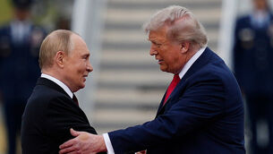 <p>US president Donald Trump greets Russian president Vladimir Putin last year at Joint Base Elmendorf-Richardson, Alaska. Picture: Julia Demaree Nikhinson/ AP</p>