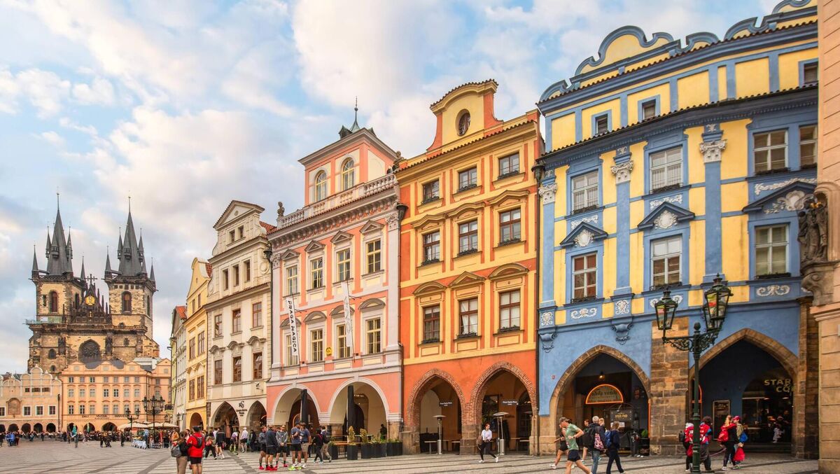 the historic Town Hall and Church of Our Lady before Týn in old town square of Prague.