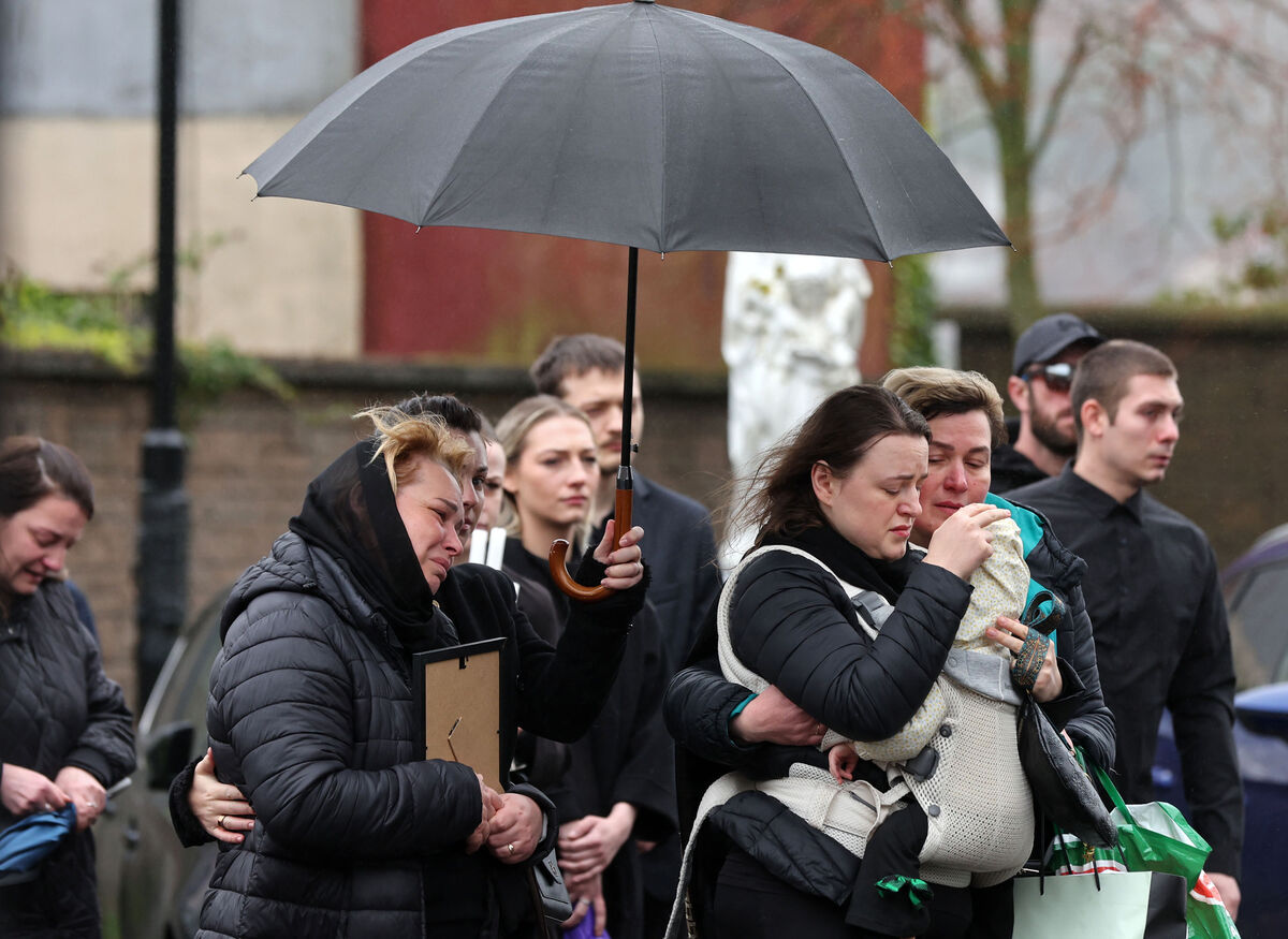  Members of Oleksandr Zhyvytskyi's family at his funeral today. Picture: Jim Coughlan