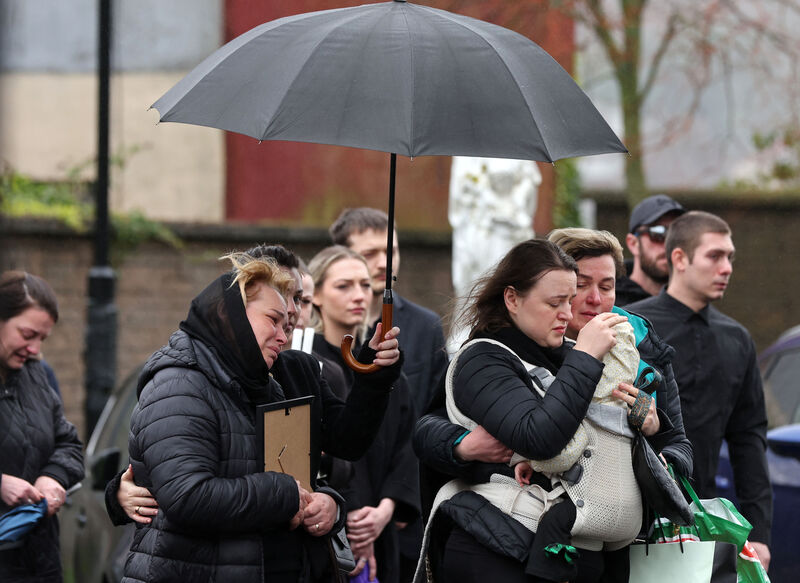  Members of Oleksandr Zhyvytskyi's family at his funeral today. Picture: Jim Coughlan