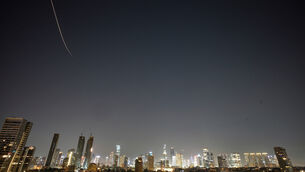 <p>Missiles launched from Iran streak across the sky over central Israel early on Tuesday, March 24. Picture: Ohad Zwigenberg/AP</p>
