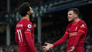 Andy Robertson (right) celebrates with Mohamed Salah (left) (Peter Byrne/PA)