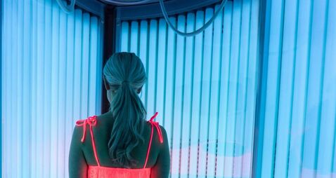 iStock-695177348.jpg Woman tanning in a solarium at the spa