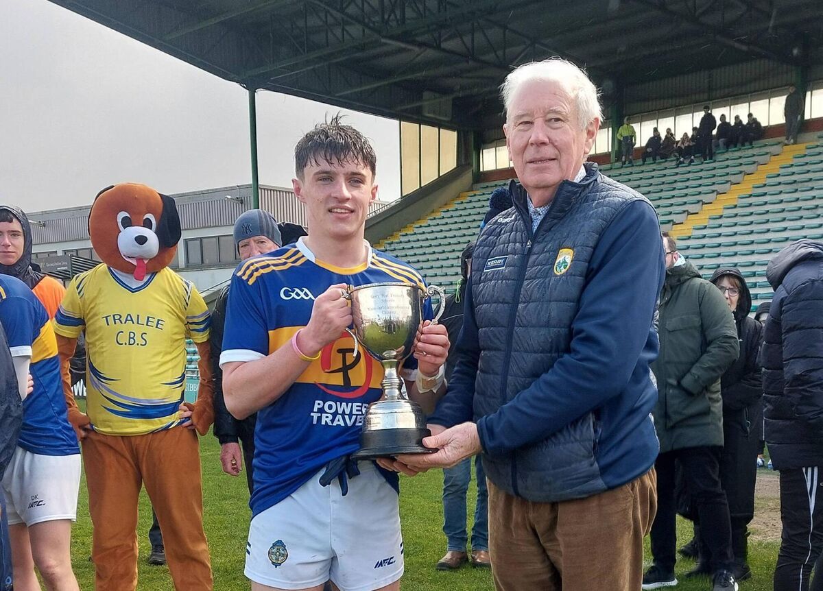 Tralee CBS captain Eoin Mangan holding the trophy. Pic: Adrienne McLoughlin