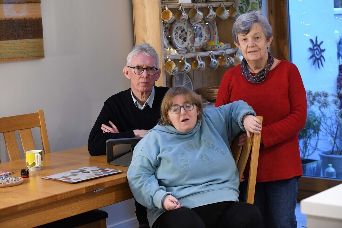 Husband and wife Tony Murray and Susan Corrigan with their 42-year-old daughter Aoife who has an intellectual disability and for whom they care full time. Picture: Moya Nolan Husband and wife Tony Murray and Susan Corrigan with their 42-year-old daughter Aoife who has an intellectual disability and for whom they care full time. Picture: Moya Nolan