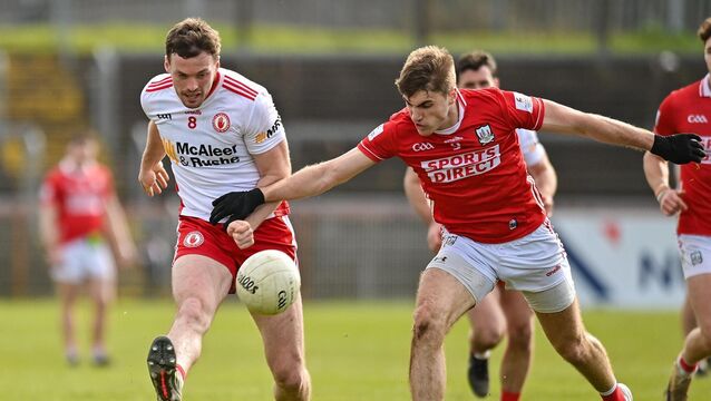 <p>HANDS ON: Ian Maguire does his best to swipe the ball from Tyrone player Brian Kennedy's grasp during their Division 2 showdown in Omagh. Pic: Oliver McVeigh/Sportsfile</p>
