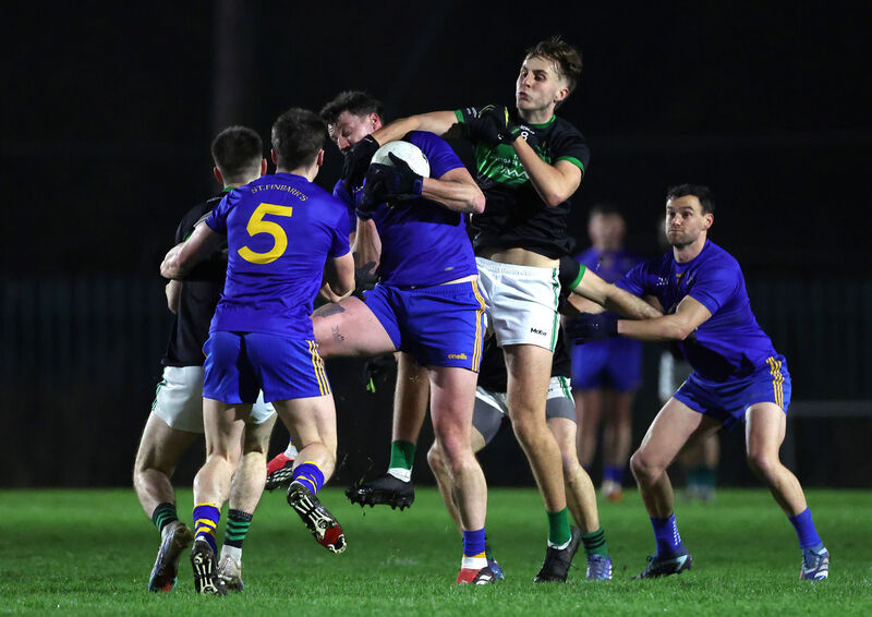 Both teams battle for possession from the kickout. Picture: Jim Coughlan