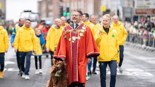 <p> Limerick mayor John Moran at the city's St Patrick's Day parade with grand marshal, marathon champion Ava Crean. Picture: Karlis Dzjamko</p>