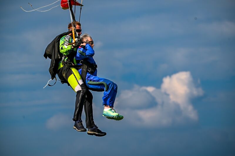Lelia Doolan marked her 90th birthday in May 2024 by jumping out of a plane whilst cruising at 15,000 feet over Offaly wearing a ceasefire sign around her neck to raise money for Médecins Sans Frontières and awareness for the situation in Gaza. Picture: Chani Anderson