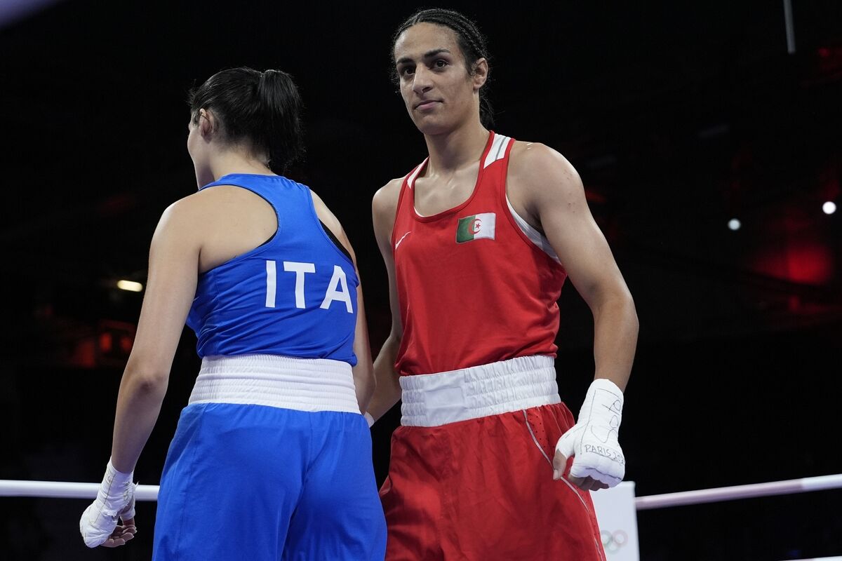 Algeria's Imane Khelif, right, after defeating Italy's Angela Carini, left, in their women's 66kg preliminary boxing match at the 2024 Summer Olympics, Thursday, Aug. 1, 2024, in Paris, France. (AP Photo/John Locher) Algeria's Imane Khelif, right, after defeating Italy's Angela Carini, left, in their women's 66kg preliminary boxing match at the 2024 Summer Olympics, Thursday, Aug. 1, 2024, in Paris, France. (AP Photo/John Locher)