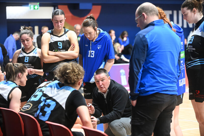  Mark Scannell, coach for UCC Glanmire, talks to the team during a timeout. Picture: Larry Cummins