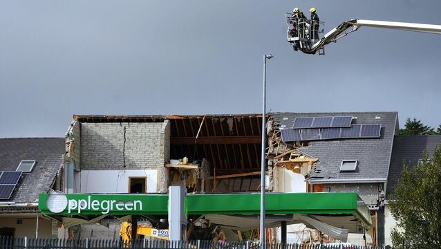 <p>Emergency services working at the scene of an explosion at Applegreen service station in the village of Creeslough in Co Donegal. Picture: Brian Lawless/PA Wire</p>