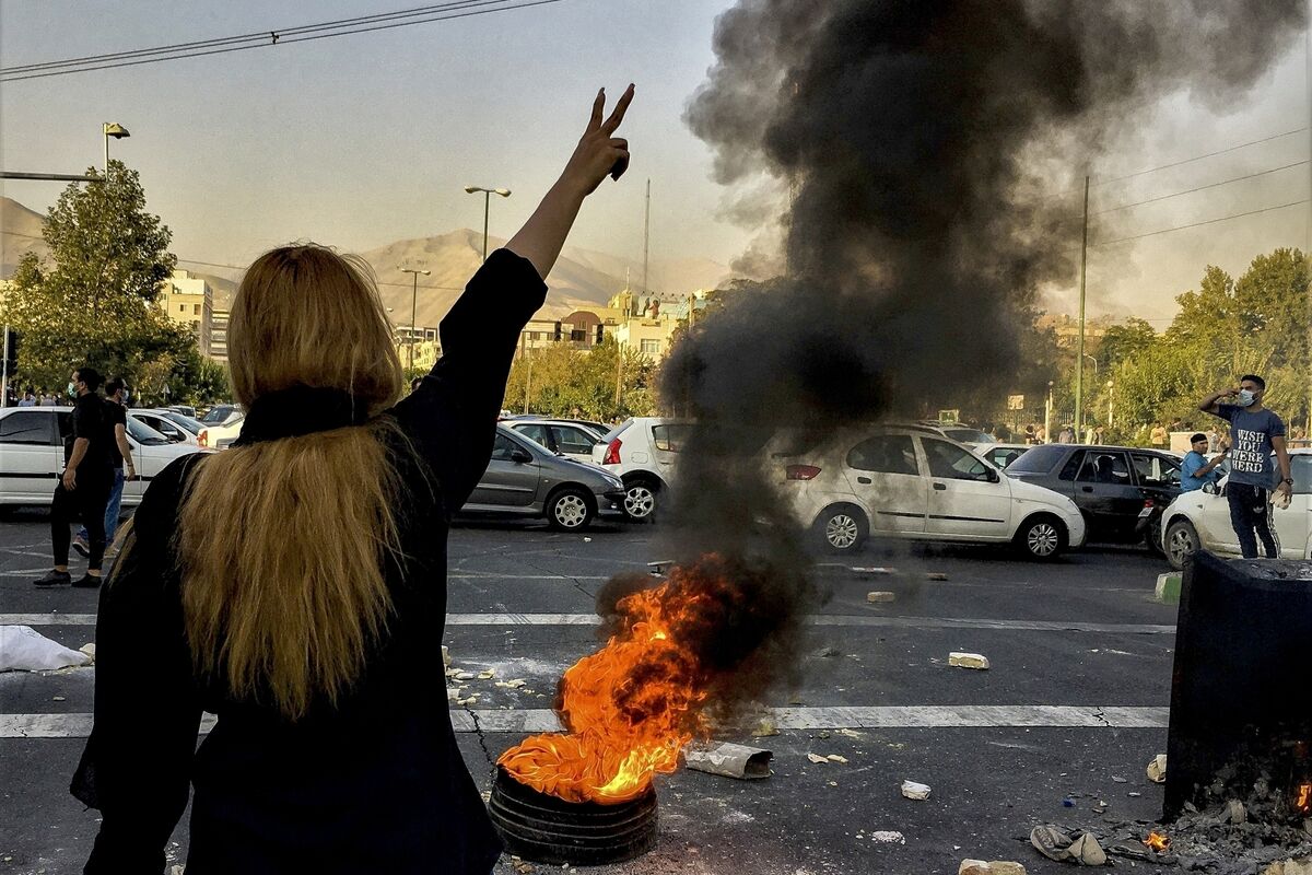 Iranians protest the death of 22-year-old Mahsa Amini after she was detained by the morality police in Tehran in 2022. Picture: Middle East Images/AP Iranians protest the death of 22-year-old Mahsa Amini after she was detained by the morality police in Tehran in 2022. Picture: Middle East Images/AP