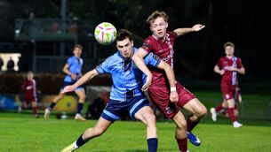 <p>UCD’s Michael McCullagh and Rhys Brennan of Cobh Ramblers. Pic: Nick Elliott/Inpho</p>