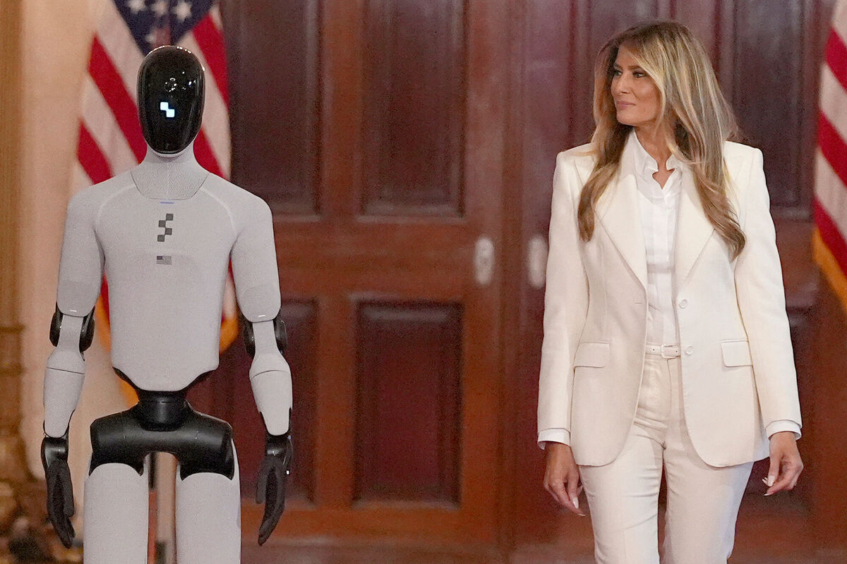 US first lady Melania Trump accompanied by a robot at the Fostering the Future Together Global Coalition Summit at the White House last Wednesday, March 25. Picture: Jacquelyn Martin/AP US first lady Melania Trump accompanied by a robot at the Fostering the Future Together Global Coalition Summit at the White House last Wednesday, March 25. Picture: Jacquelyn Martin/AP