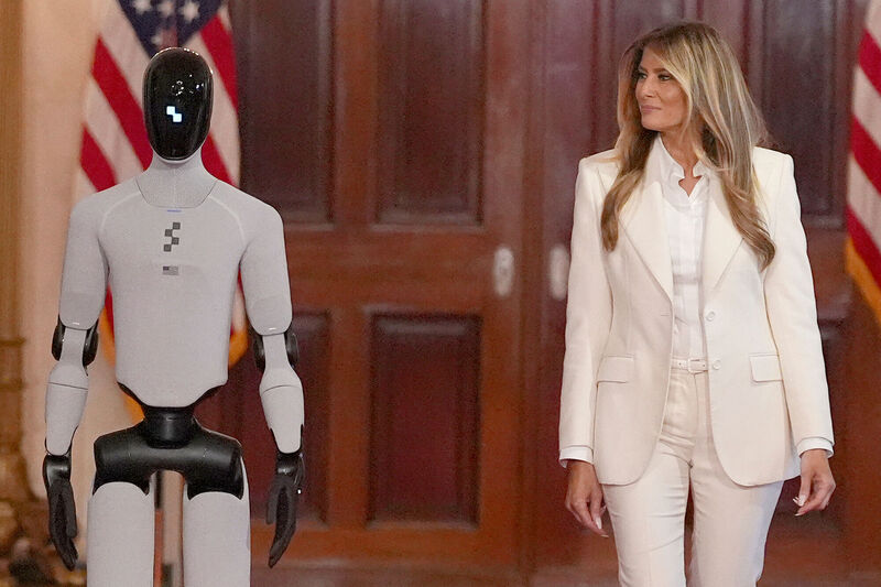 US first lady Melania Trump accompanied by a robot at the Fostering the Future Together Global Coalition Summit at the White House last Wednesday, March 25. Picture: Jacquelyn Martin/AP