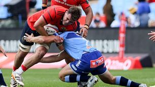 <p>THE WALL: Brian Gleeson of Munster is tackled by Johan Grobbelaar of Vodacom Bulls with Michael Ala’alatoa of Munster in support. Pic: Darren Stewart/SHS/Inpho</p>