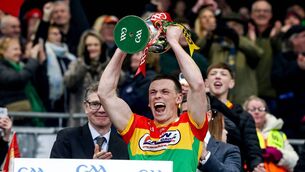<p>Mikey Bambrick creates history as the first captain of a Carlow senior football team to lift silverware at Croke Park. Pic: Nick Elliott/Inpho</p>