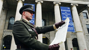 <p>Captain Austin Doyle with the Proclamation of Independence following a ceremony at the GPO on O’Connell St in Dublin to mark the anniversary of the 1916 Easter Rising in 2023. <span class="contextmenu emphasis CaptionCredit">Picture: Brian Lawless/ PA</span>
            </p>