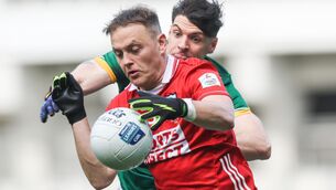 <p>Cork's Steven Sherlock and Seamus Lavin of Meath. Pic: INPHO/Tom Maher</p>