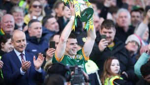 <p>Meath captain Eoghan Frayne lifts the trophy. Pic: INPHO/Tom Maher</p>