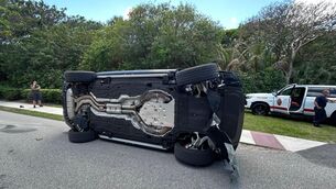 <p>This photo provided by the Martin County Sheriff's Office shows the overturned vehicle in a rollover crash which involved Tiger Woods in Jupiter Island, Florida. Pic: Martin County Sheriff's Office via AP</p>