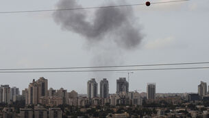 <p>Smoke billows in Beersheba, southern Israel after it was struck by an Iranian missile Sunday, March 29, 2026.  Picture: AP Photo/Maya Levin</p>