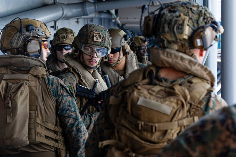 This image from video provided by U.S. Central Command shows U.S. Sailors and Marines aboard USS Tripoli (LHA 7) arriving in the U.S. Central Command area of responsibility, March 27, 2026. Picture: U.S. Central Command via AP