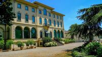 June 2021 Parma, Italy: Fondation Magnani Rocca. Beautiful building of museum, garden with fountains, flowers, trees, and bushes