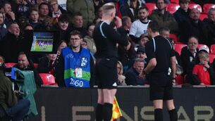 <p>Referee Sven Jablonski views the VAR monitor before awarding a penalty to Uruguay during the international friendly match at Wembley Stadium, London. Picture: Bradley Collyer/PA Wire. </p>