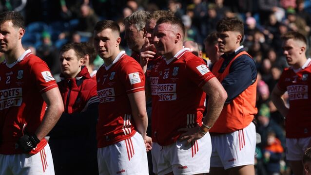<p>Cork players dejected after the Meath loss. Pic: Tom Maher/Inpho</p>